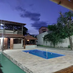 Quarto em Acomodações Particulares Palmeiras Suites, Cabo Frio